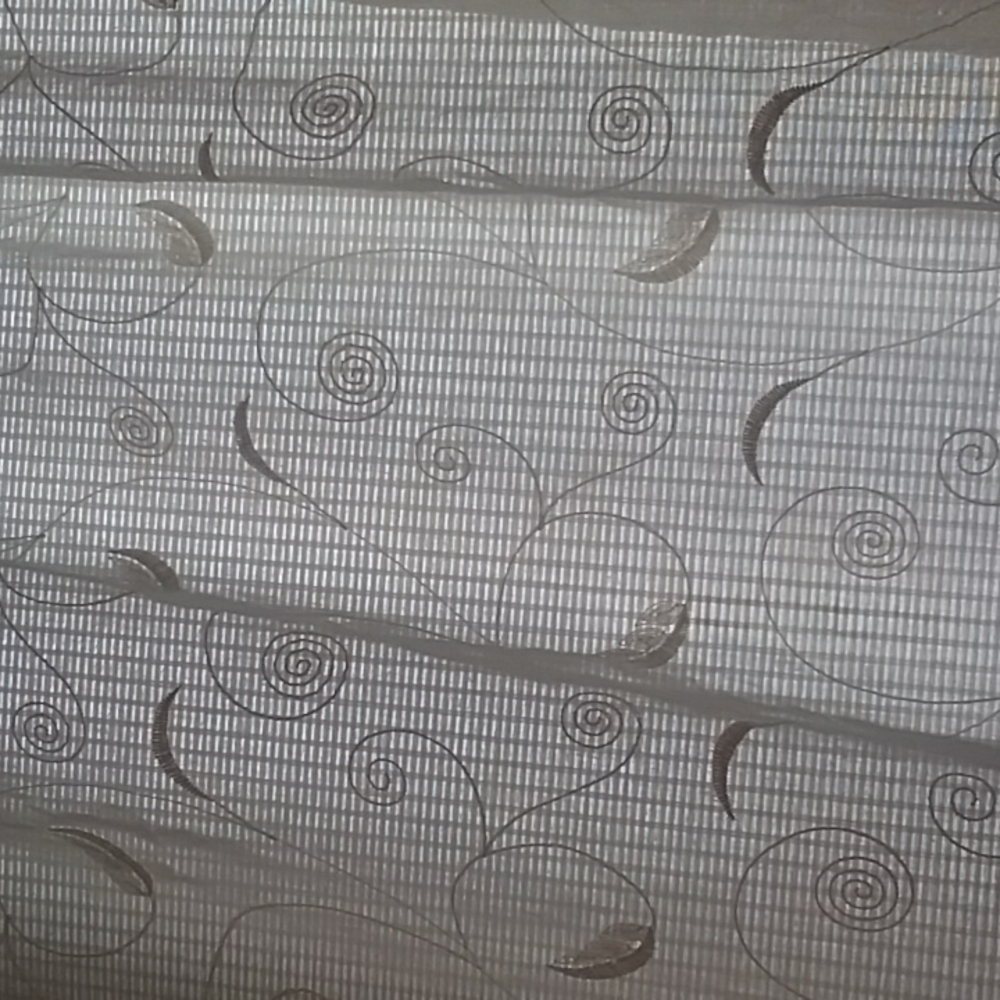 Two Ivory Curtain Panels.